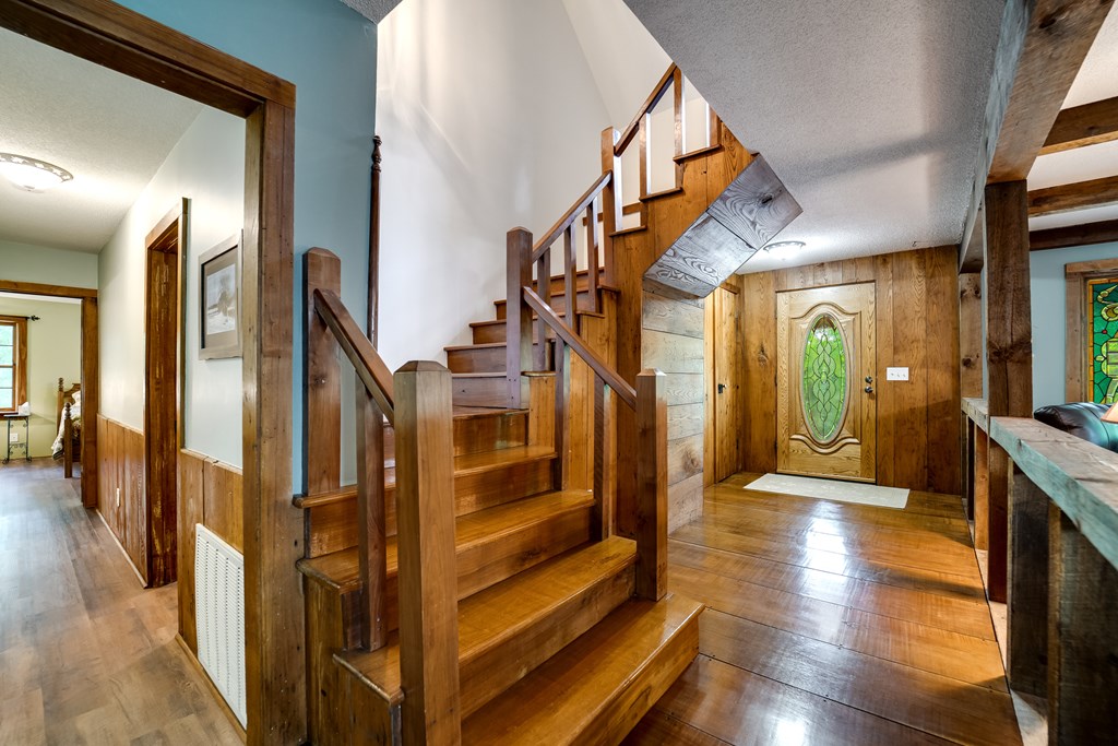 Grand entry and upper floor staircase