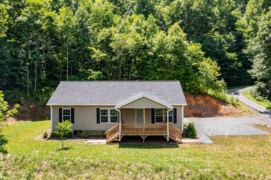 Spacious yard with front porch