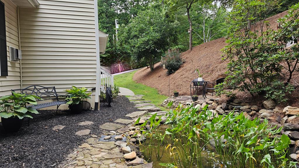 Gorgeous Koi Pond and pleasing landscape features