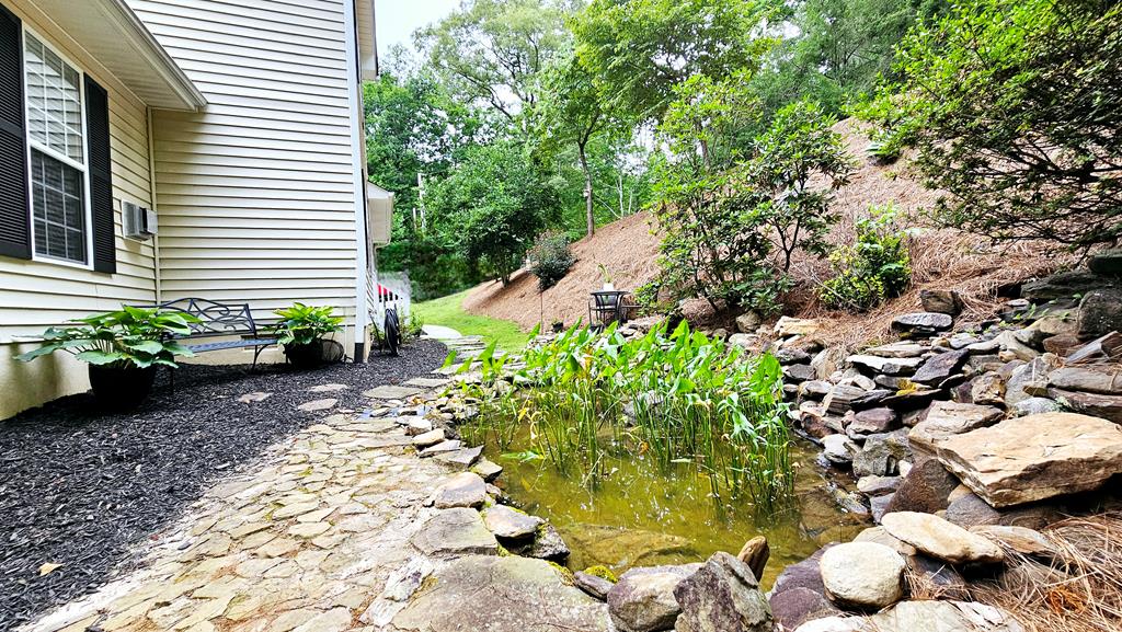 Gorgeous Koi Pond and pleasing landscape features