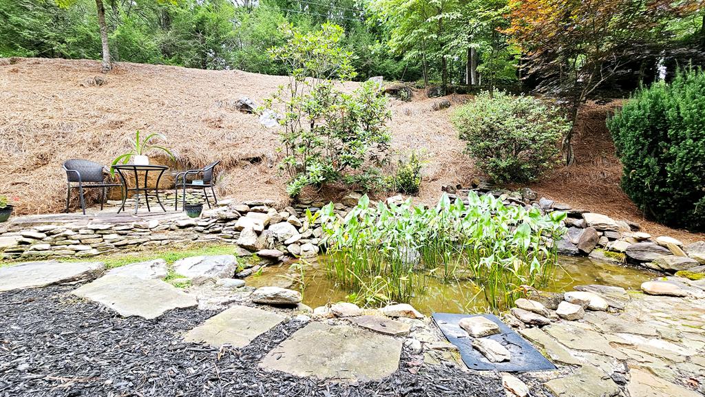Gorgeous Koi Pond and pleasing landscape features