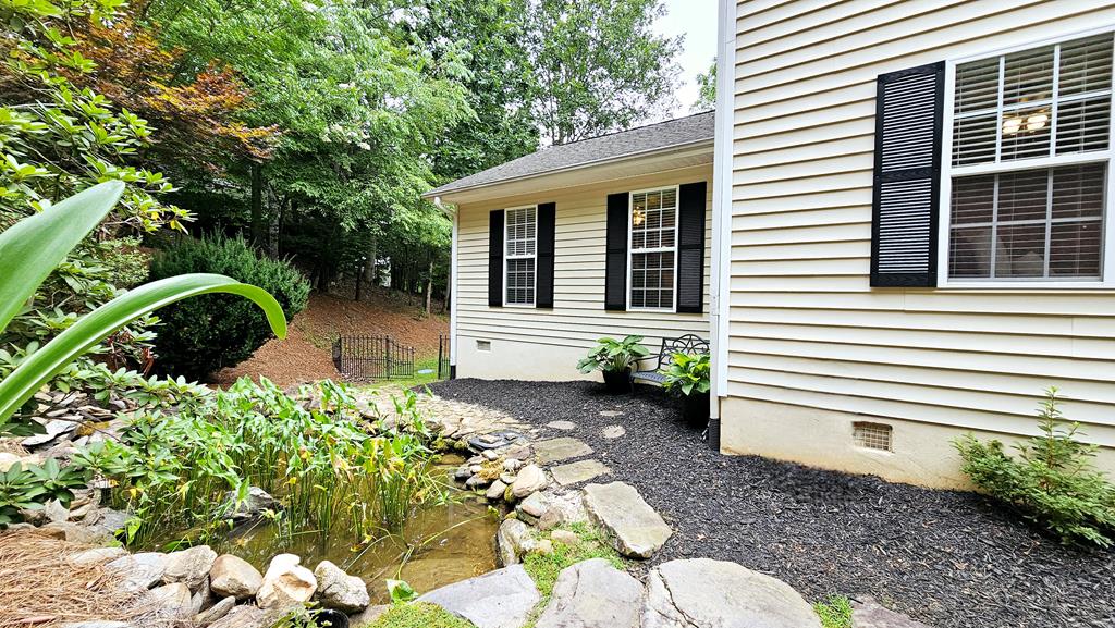 Gorgeous Koi Pond and pleasing landscape features