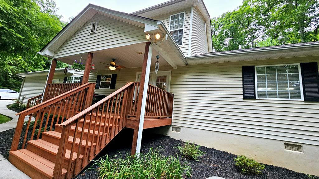 Rear Covered Deck with Kitchen Access