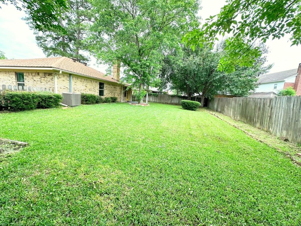 Large fenced yard for kids & fur babies to play