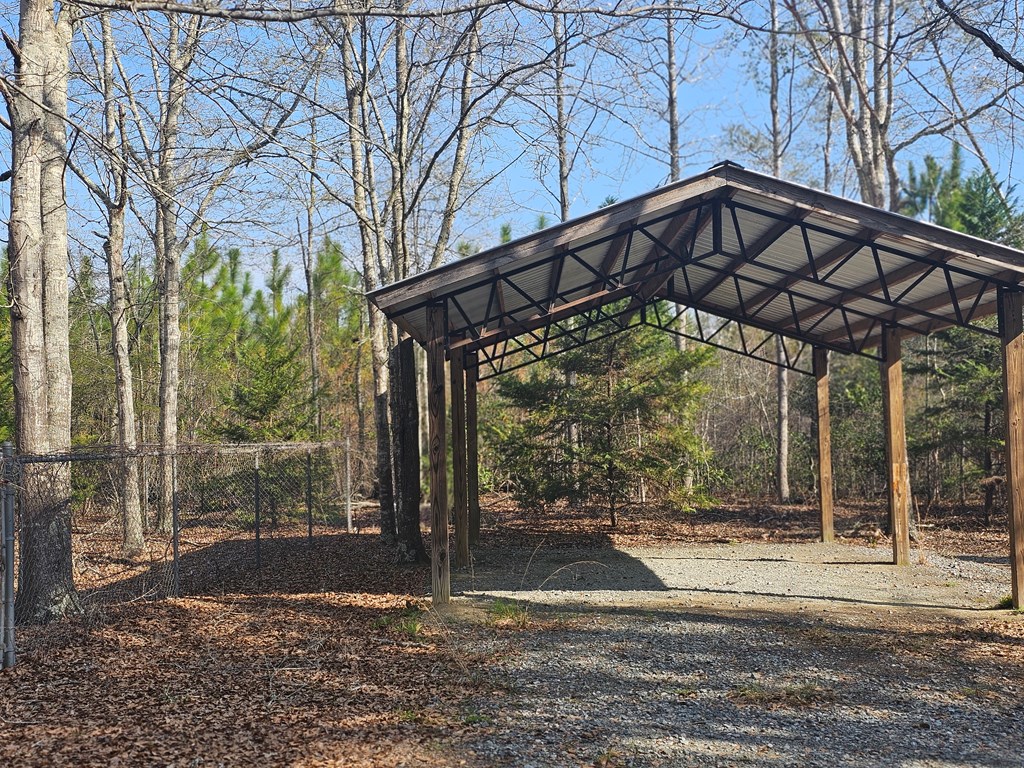 Covered parking shelter