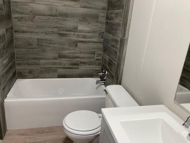 Hall Bath with Tiled Shower in Bath