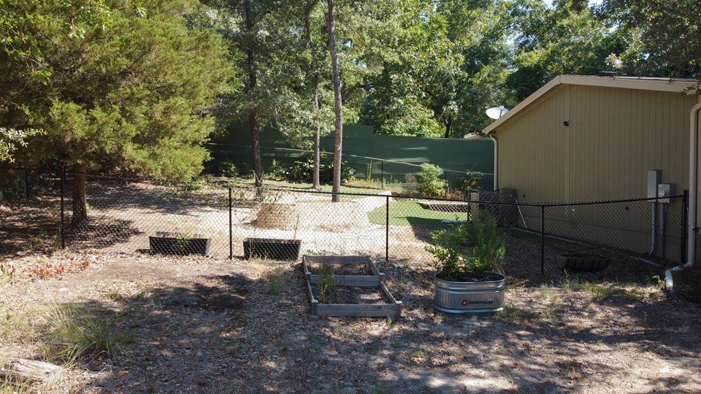 Large fenced in yard for the kids or pets. 