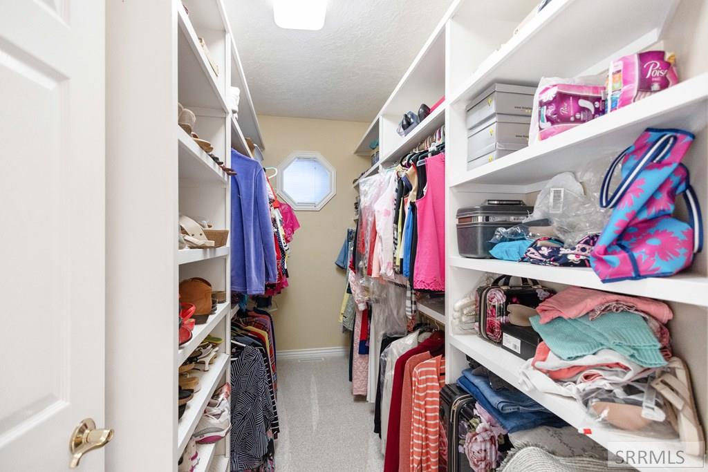 Main Floor Master Suite Walk-In Closet