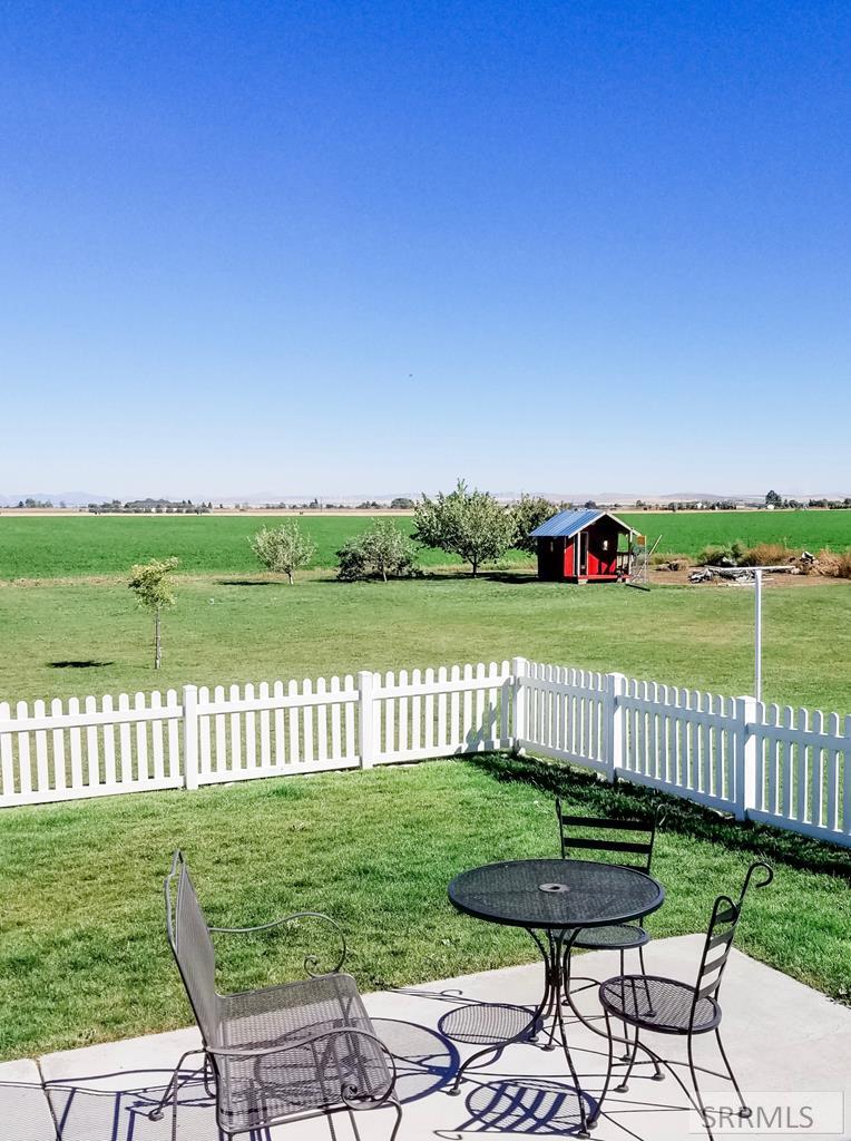 BACK YARD WITH FENCED IN PORTION