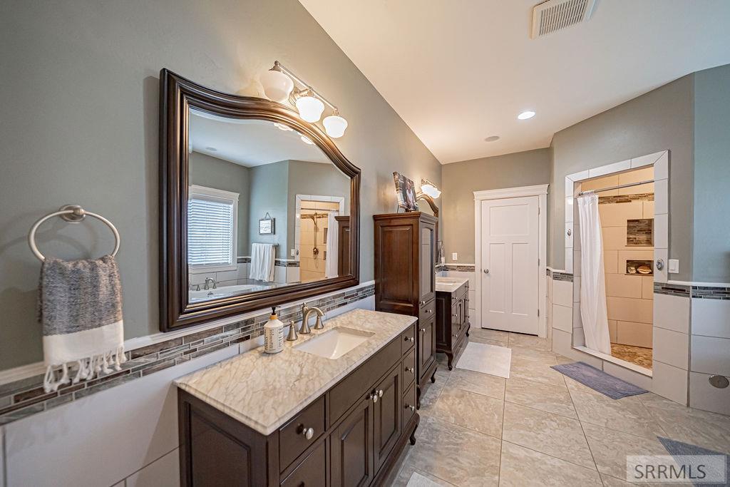 Primary Bathroom with Double Vanities 