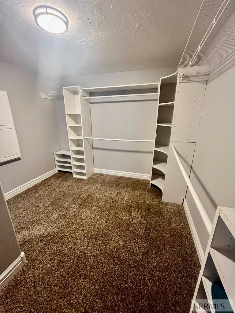 Walk in closet in master bedroom