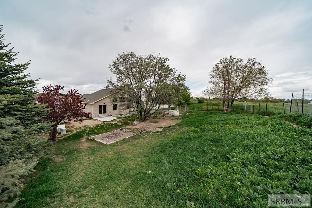 Backyard View standing at top of back property