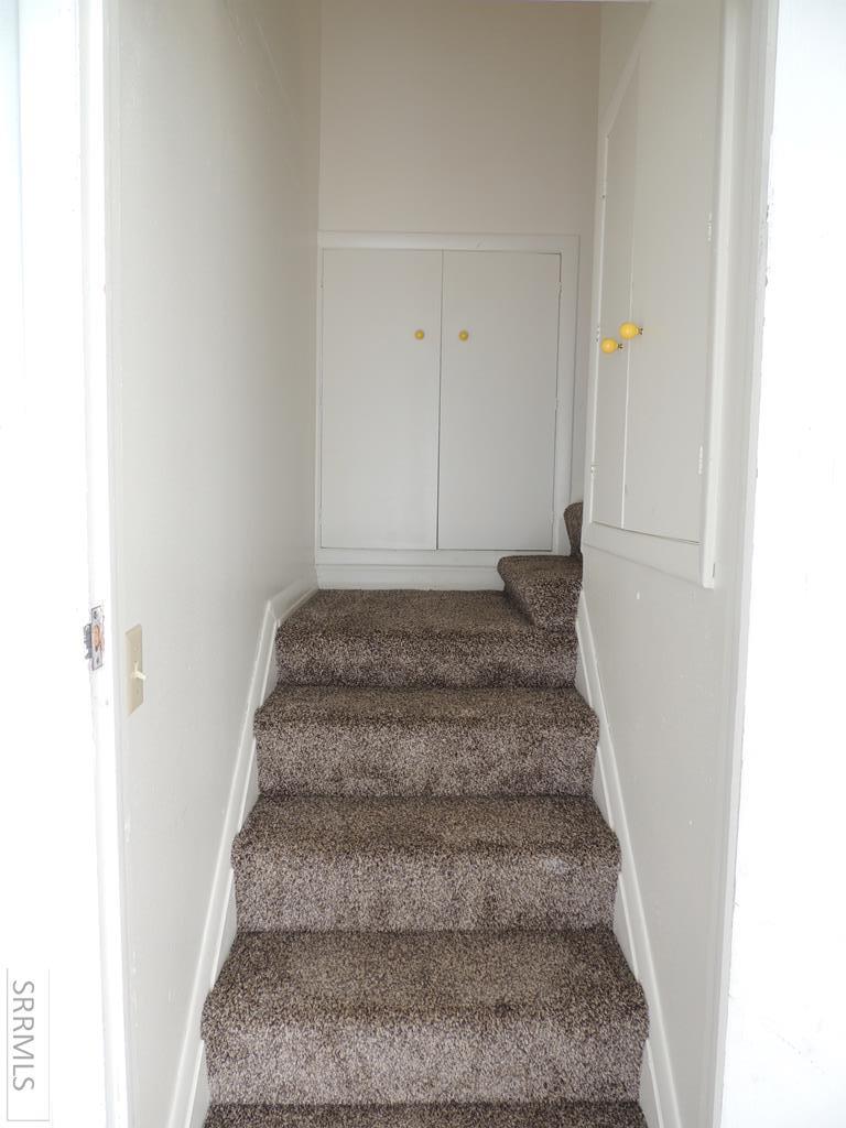 Stairs to upper level bonus room 