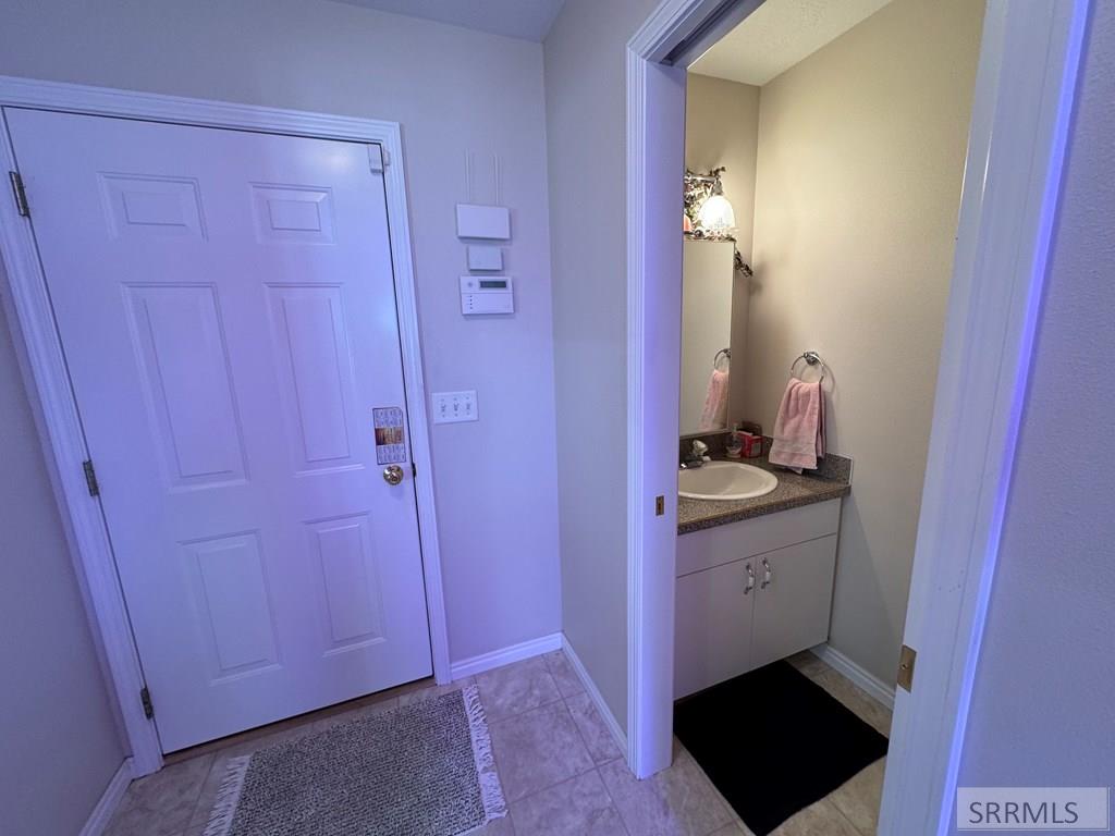 Half bath off kitchen, garage entrance