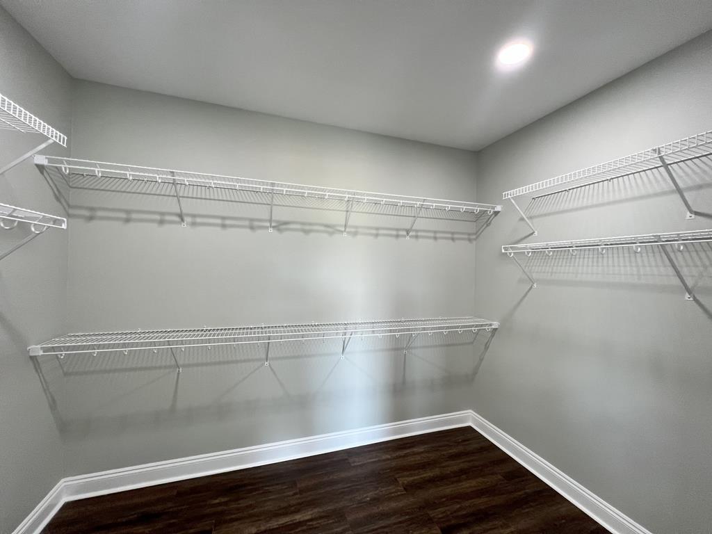 PREVIOUS BUILD PRIMARY BEDROOM WALK IN CLOSET