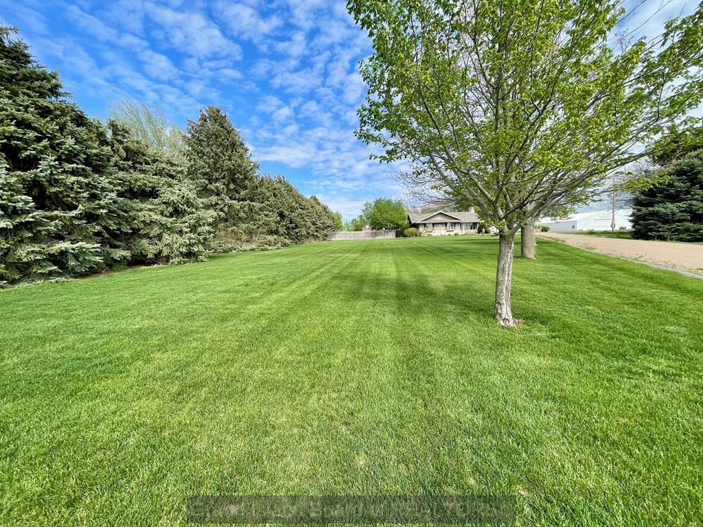 Large front yard looking from L Rd