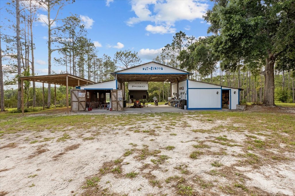 Barn with New Covered Parking on left.