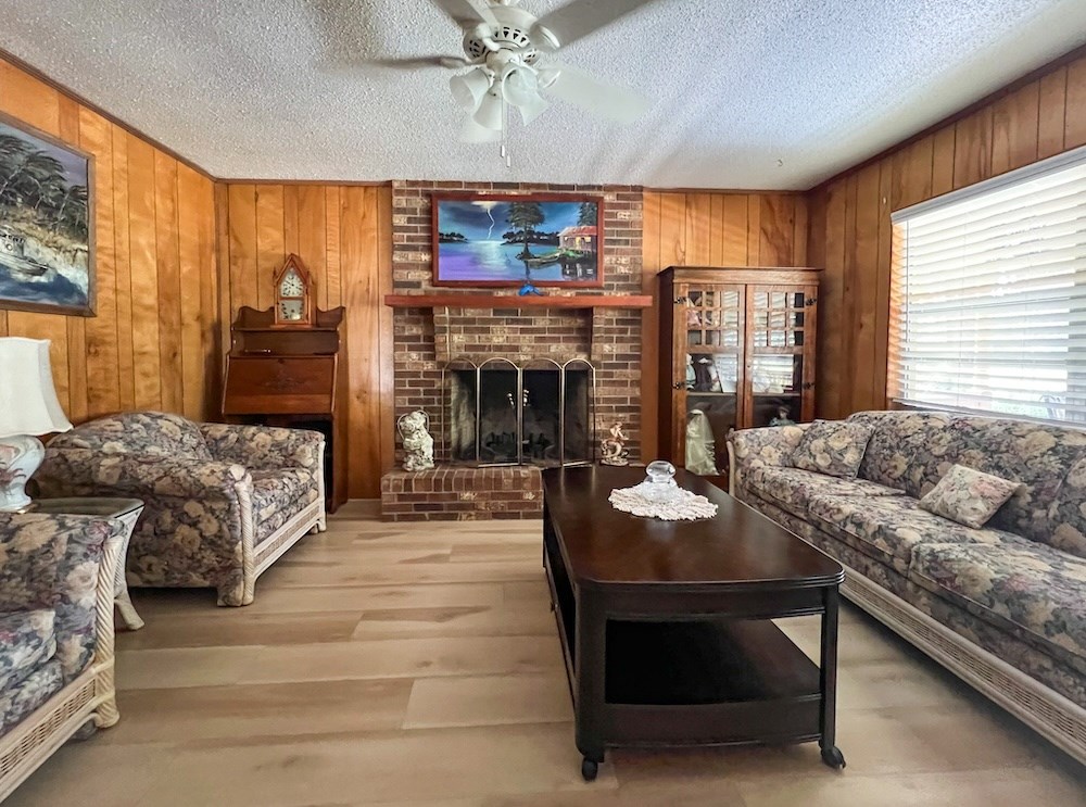 Living Room with Brick Fireplace