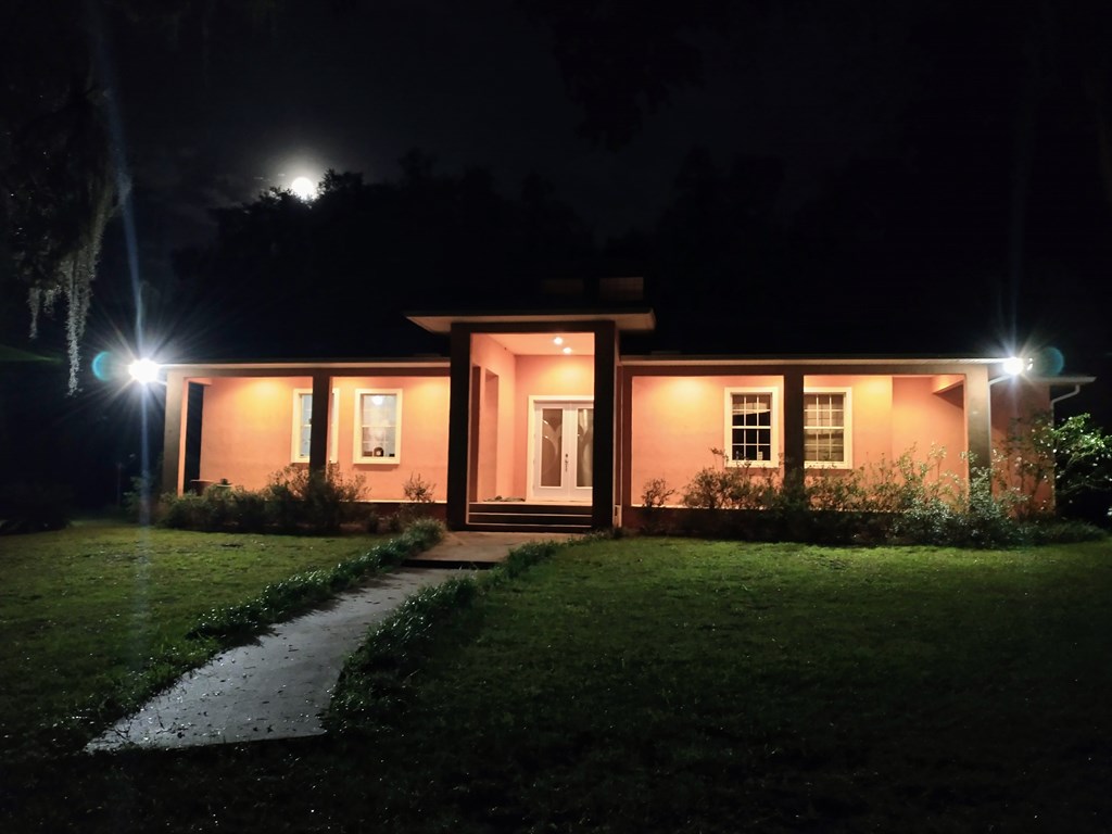 Moon rising over the house