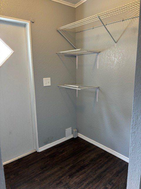 laundry room with shelving