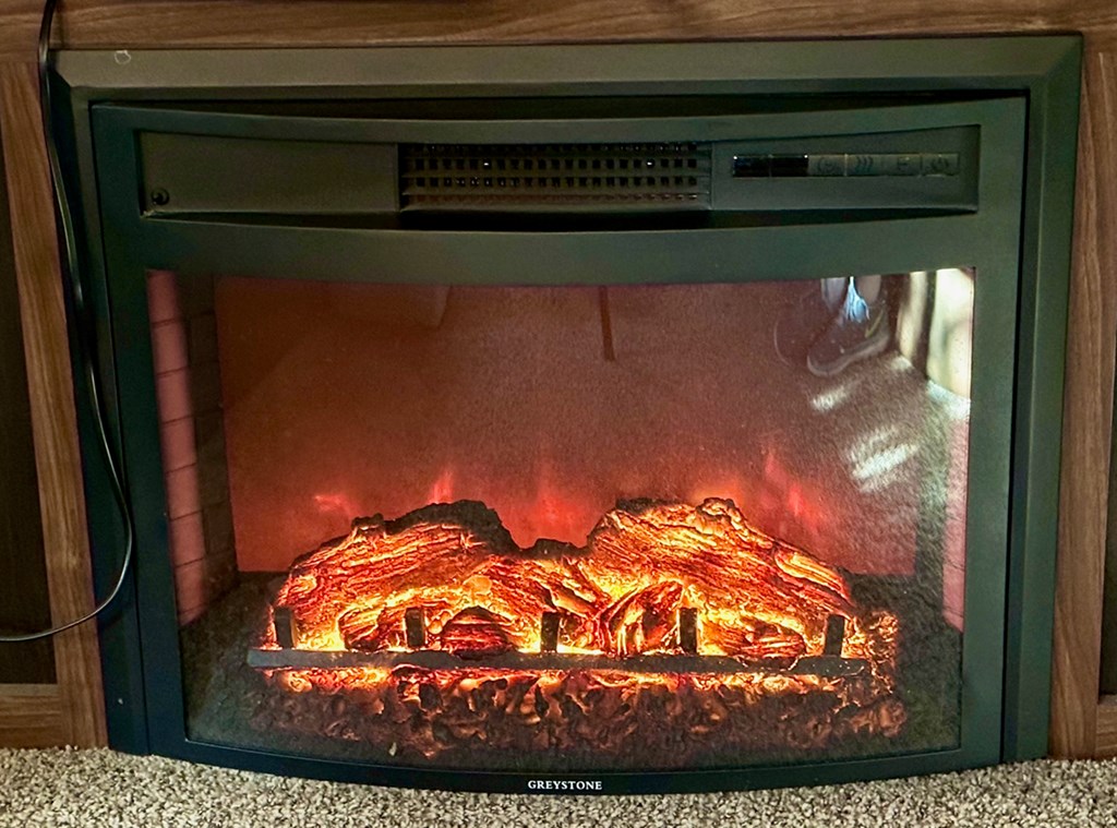 Electric Fireplace Included