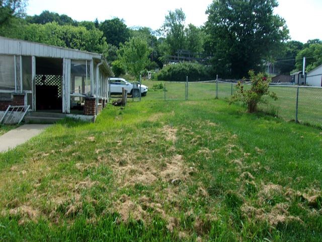 Fenced Side Yard and Sunporch