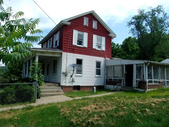 Side of House and Sunporch